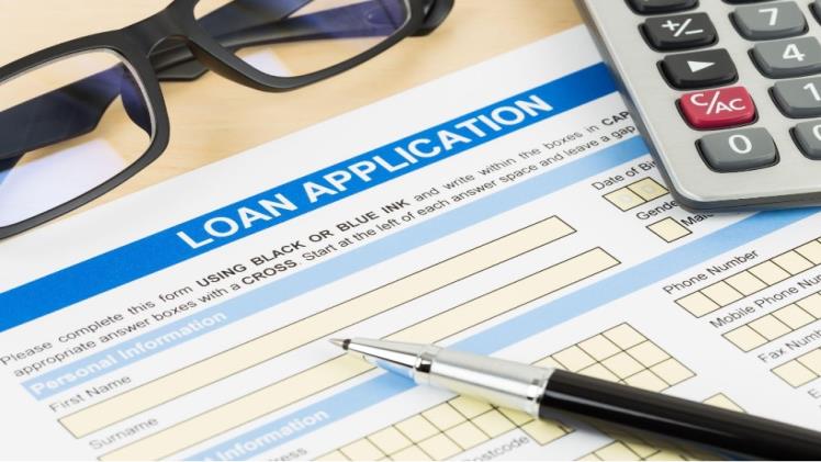 How to Get a Loan with No Credit: Tips and Strategies for First-Time Borrowers loan application on desk